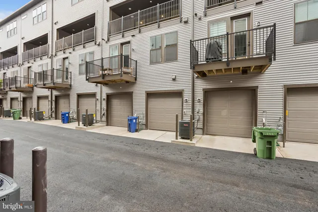 a front view of a building with a street