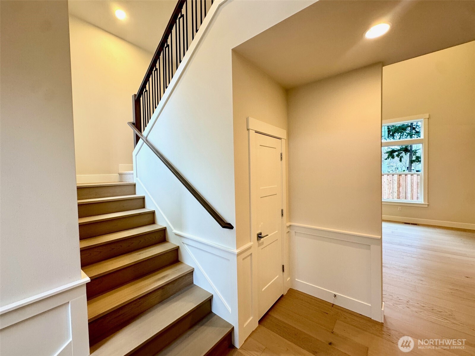 9207 Northeast 175th Street, Unit B Bothell, WA 98011 - Photo 12 of 33 a view of entryway with wooden floor and stairs