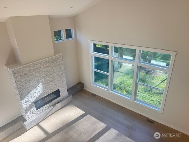 9207 Northeast 175th Street, Unit B Bothell, WA 98011 - Photo 13 of 33 a view of an empty room with a window