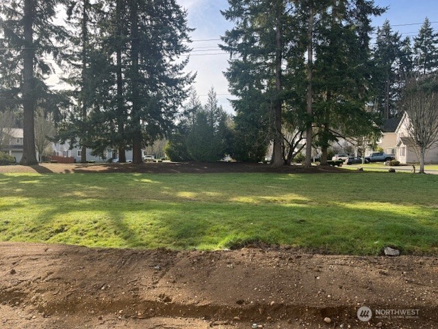 9207 Northeast 175th Street, Unit B Bothell, WA 98011 - Photo 15 of 33 a view of a lake with a trees