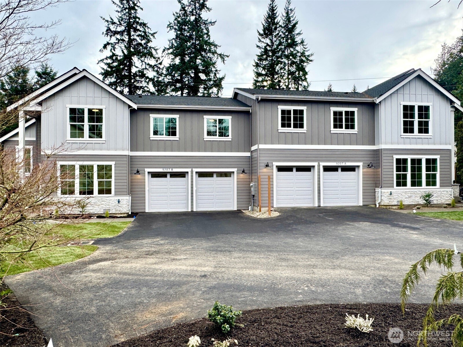 9207 Northeast 175th Street, Unit B Bothell, WA 98011 - Photo 28 of 33 a view of a house with a swimming pool