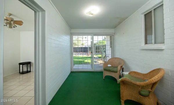 a living room with furniture and a window