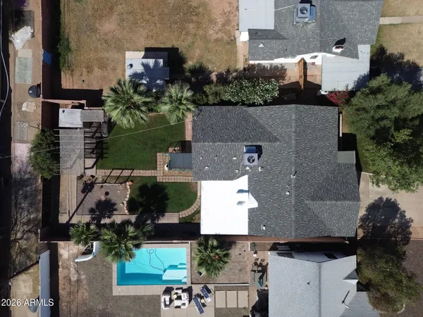 an aerial view of houses and roads