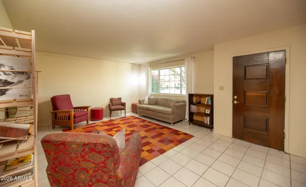 a bedroom with double bed and a closet