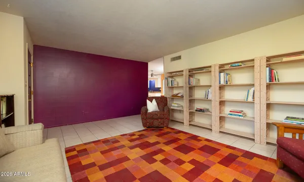 a bedroom with a bed and closet