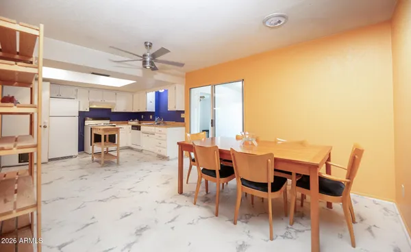 a view of a dining room with furniture