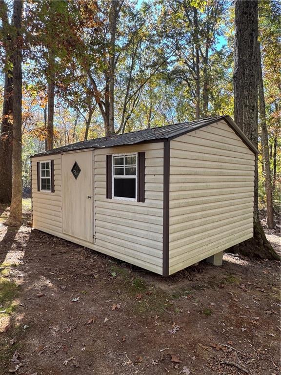 2193 Ruckersville Road Elberton, GA 30635 - Photo 6 of 6 a view of a house with a yard