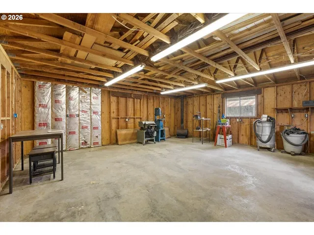 a big room with table and chairs