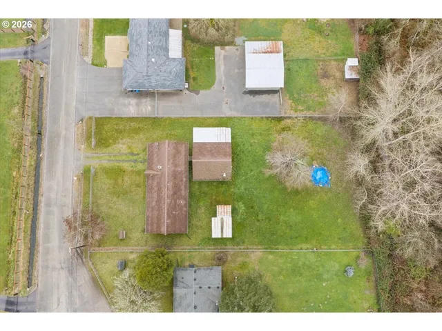 a bathroom with a sink mirror and a bathtub