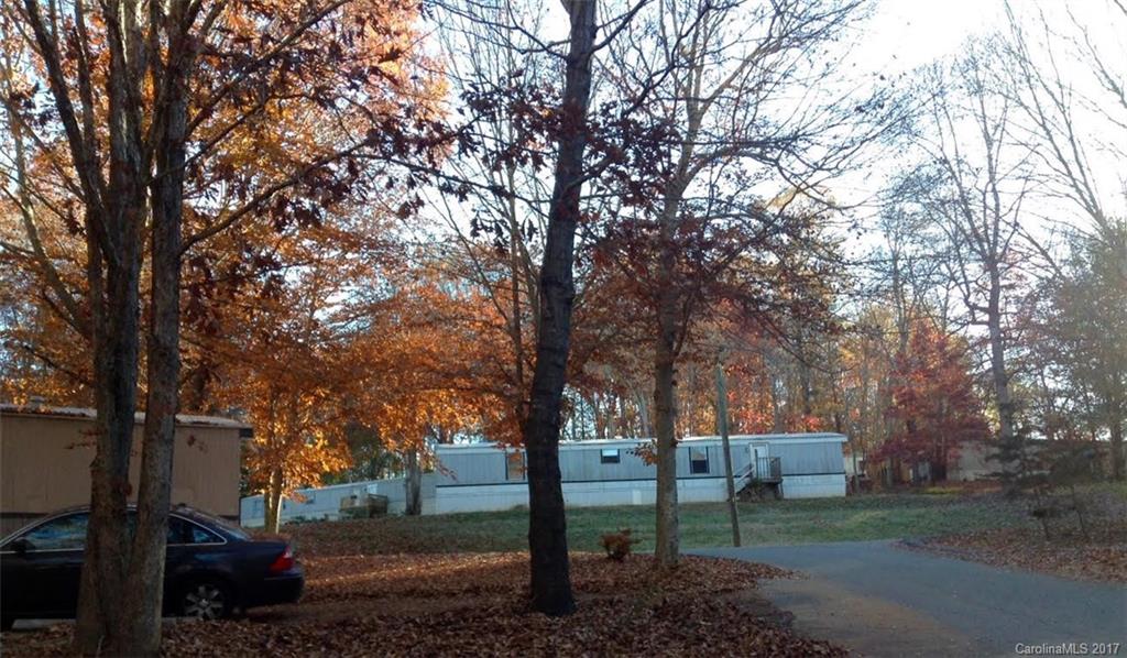 169 St John Zion Road Rutherfordton, NC 28139 - Photo 7 of 14 a view of a backyard with large trees