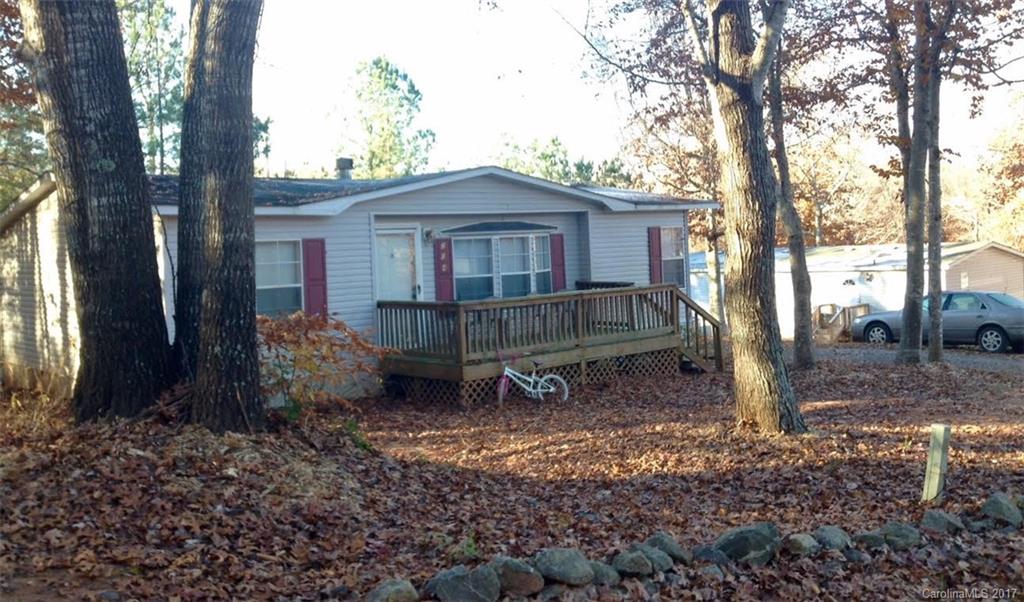 169 St John Zion Road Rutherfordton, NC 28139 - Photo 10 of 14 a view of a house with a yard and large tree