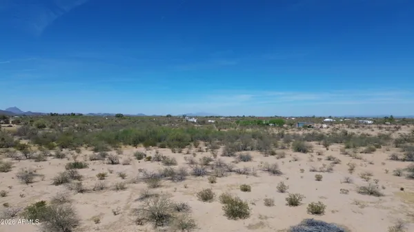 a view of a lake with mountain