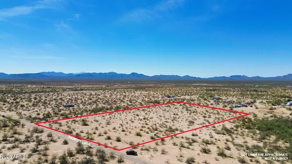 a view of a road with a yard