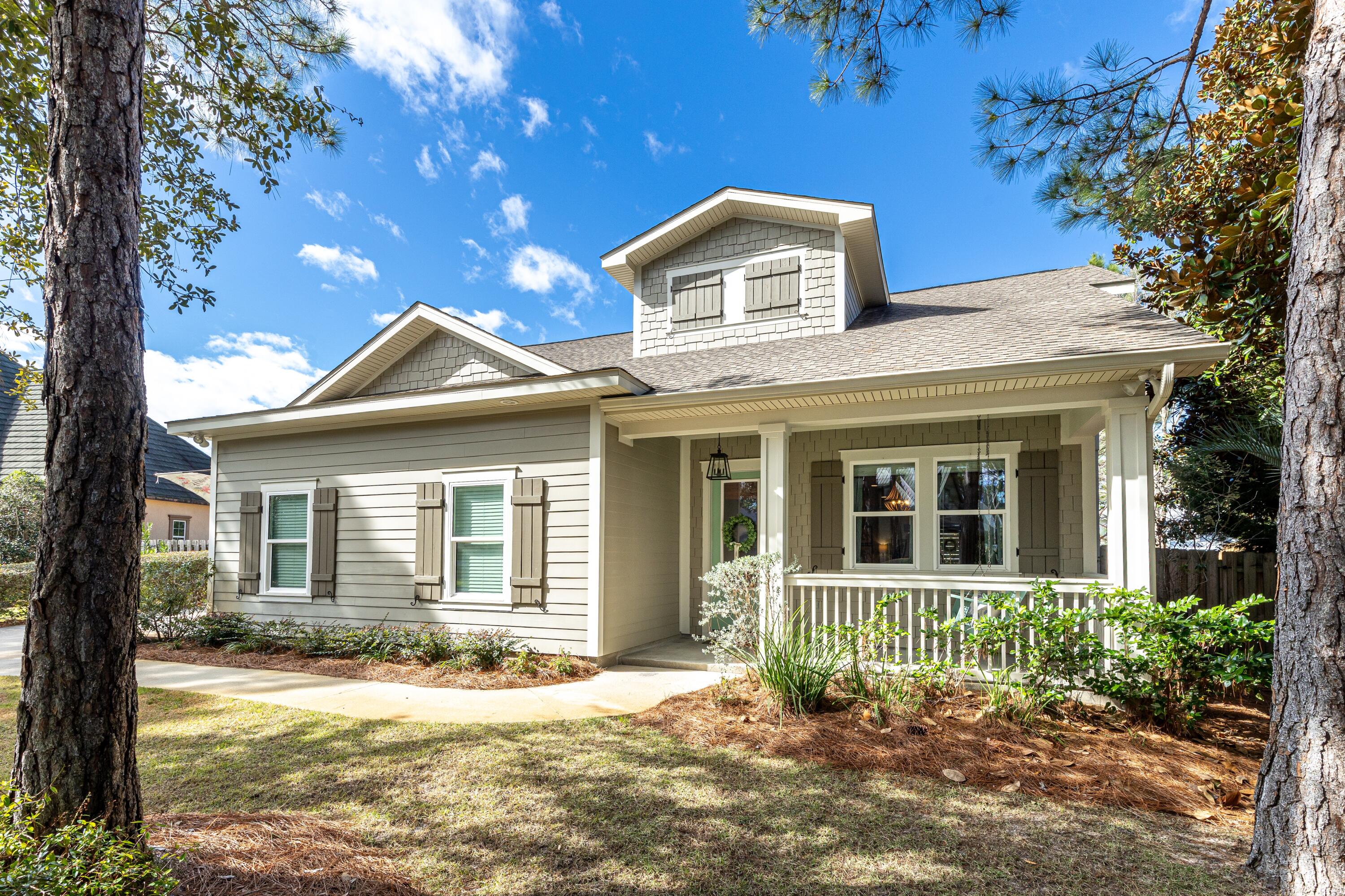 101 Botany Boulevard Santa Rosa Beach, FL 32459 - Photo 1 of 53 front view of a house with a yard