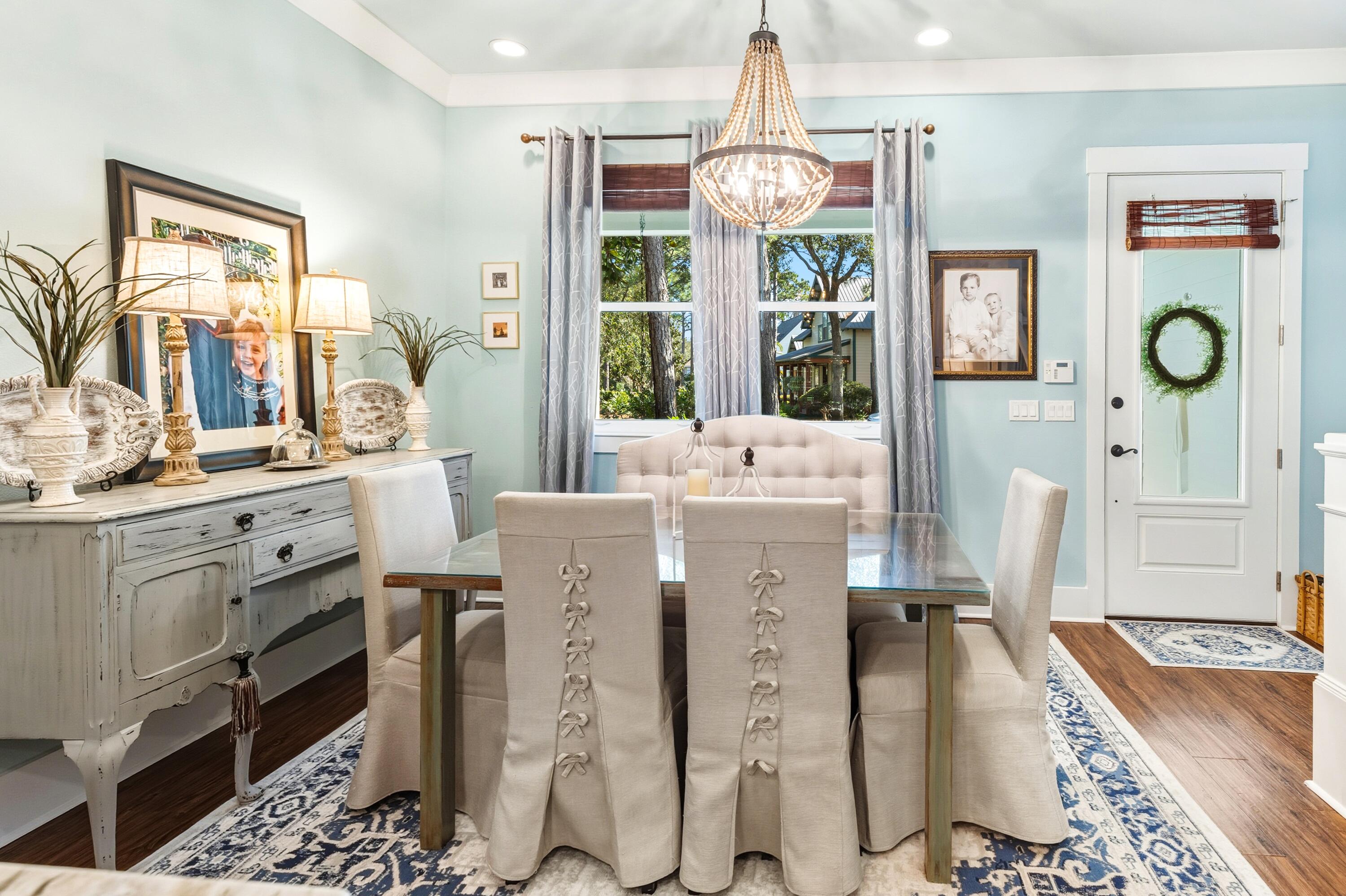 101 Botany Boulevard Santa Rosa Beach, FL 32459 - Photo 16 of 53 a very nice looking room with kitchen island furniture and a chandelier