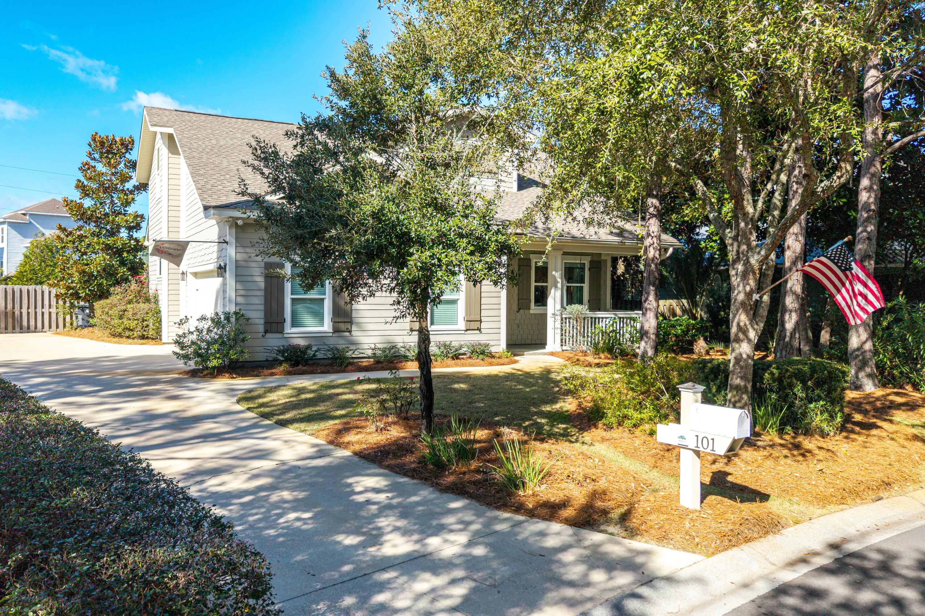101 Botany Boulevard Santa Rosa Beach, FL 32459 - Photo 2 of 53 a view of a house with palm tree in the background