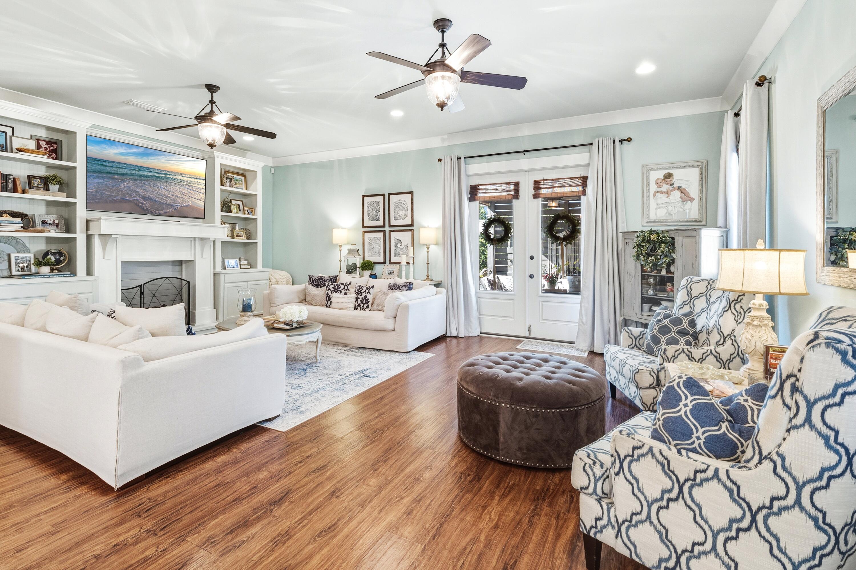 101 Botany Boulevard Santa Rosa Beach, FL 32459 - Photo 23 of 53 a living room with furniture and a fireplace