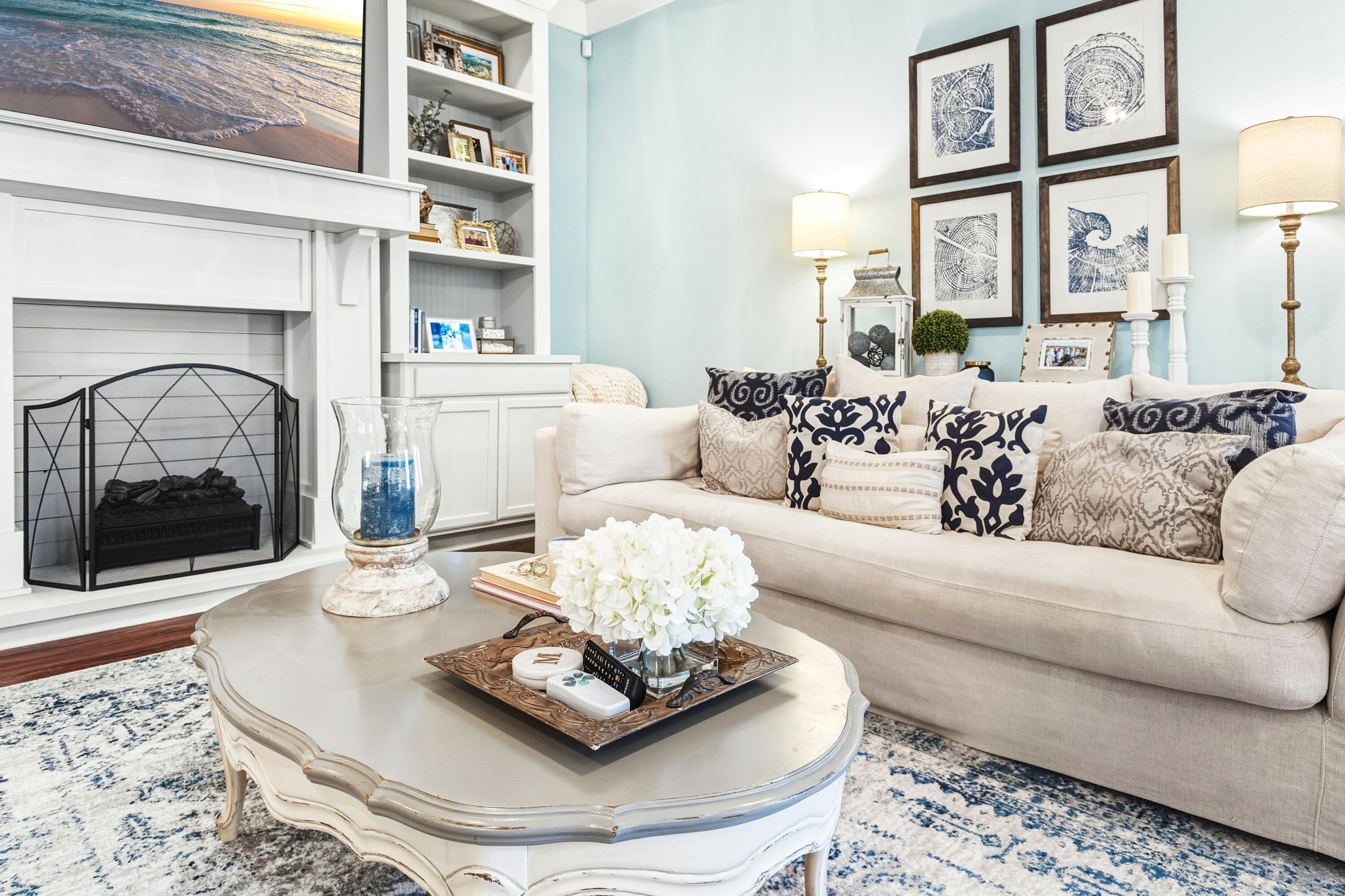 101 Botany Boulevard Santa Rosa Beach, FL 32459 - Photo 25 of 53 a living room with furniture and a fireplace