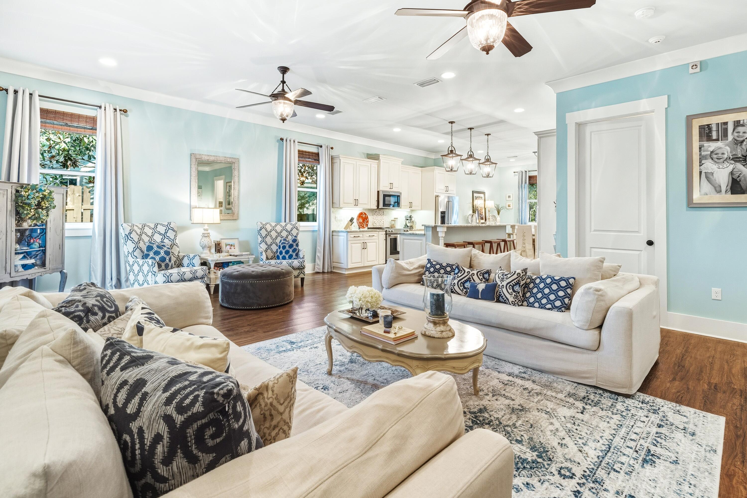 101 Botany Boulevard Santa Rosa Beach, FL 32459 - Photo 26 of 53 a living room with furniture ceiling fan and a rug