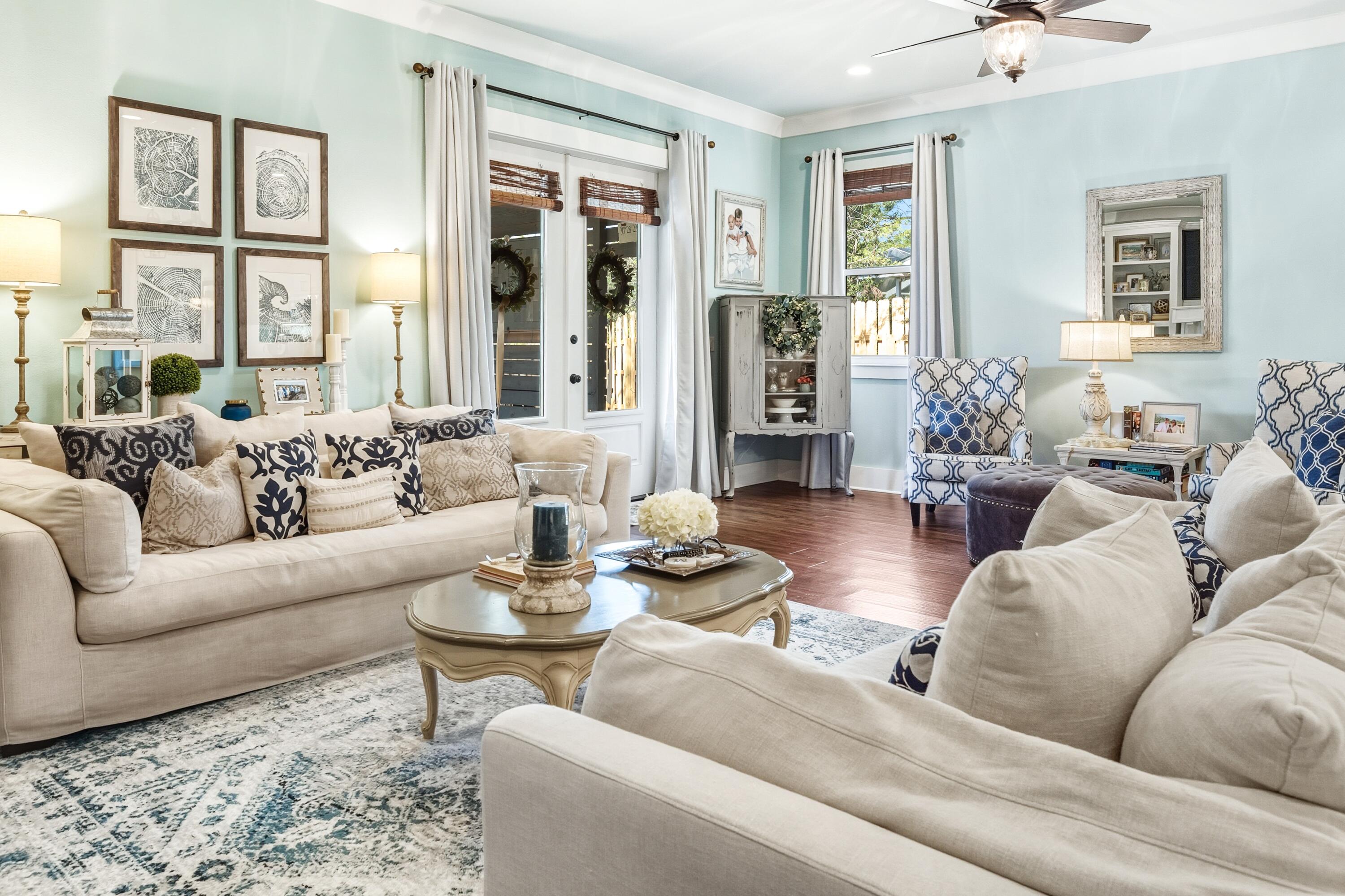 101 Botany Boulevard Santa Rosa Beach, FL 32459 - Photo 27 of 53 a living room with furniture and a large window