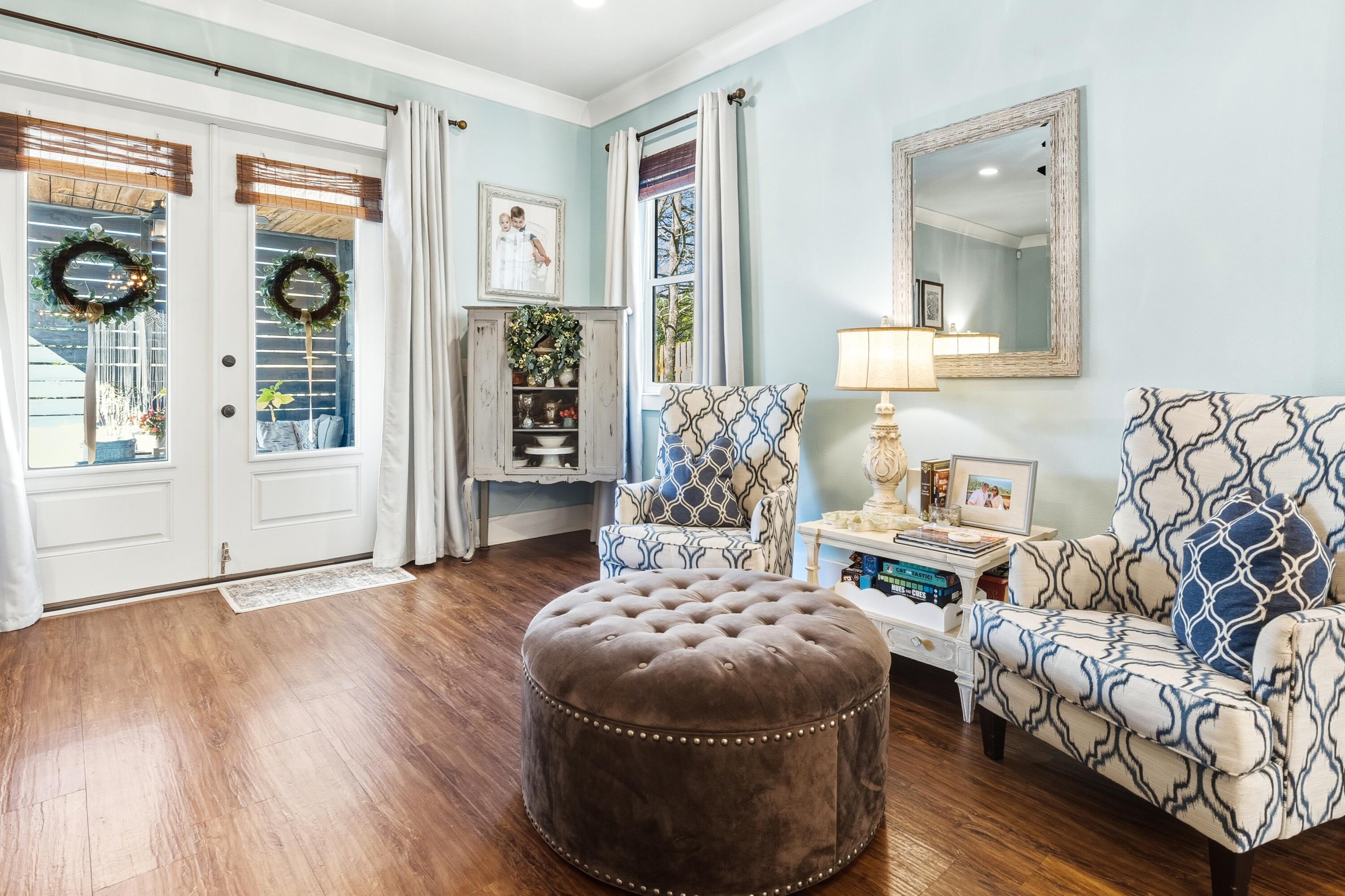 101 Botany Boulevard Santa Rosa Beach, FL 32459 - Photo 28 of 53 a living room with furniture and a fireplace