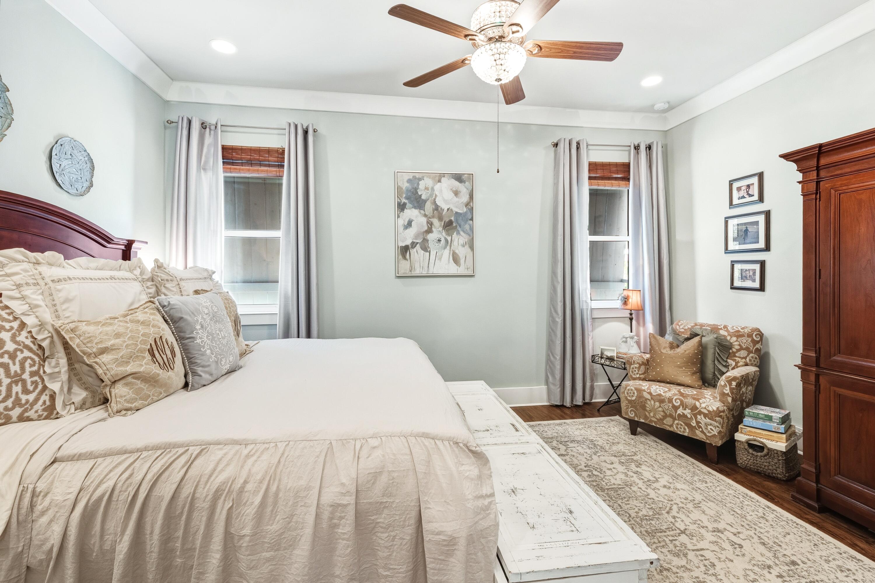 101 Botany Boulevard Santa Rosa Beach, FL 32459 - Photo 33 of 53 a bedroom with a large bed and a couch