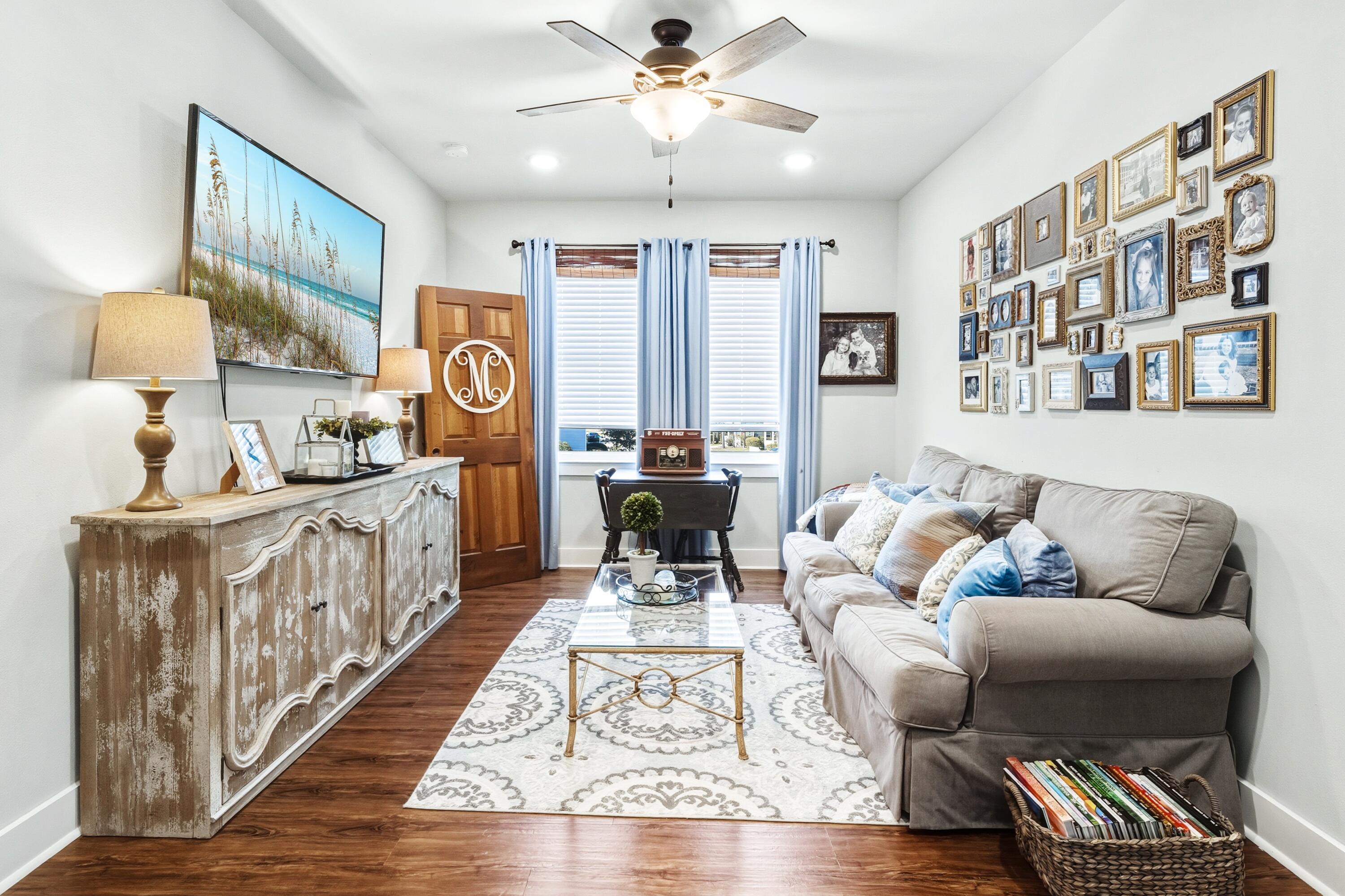 101 Botany Boulevard Santa Rosa Beach, FL 32459 - Photo 38 of 53 a living room with furniture and a rug