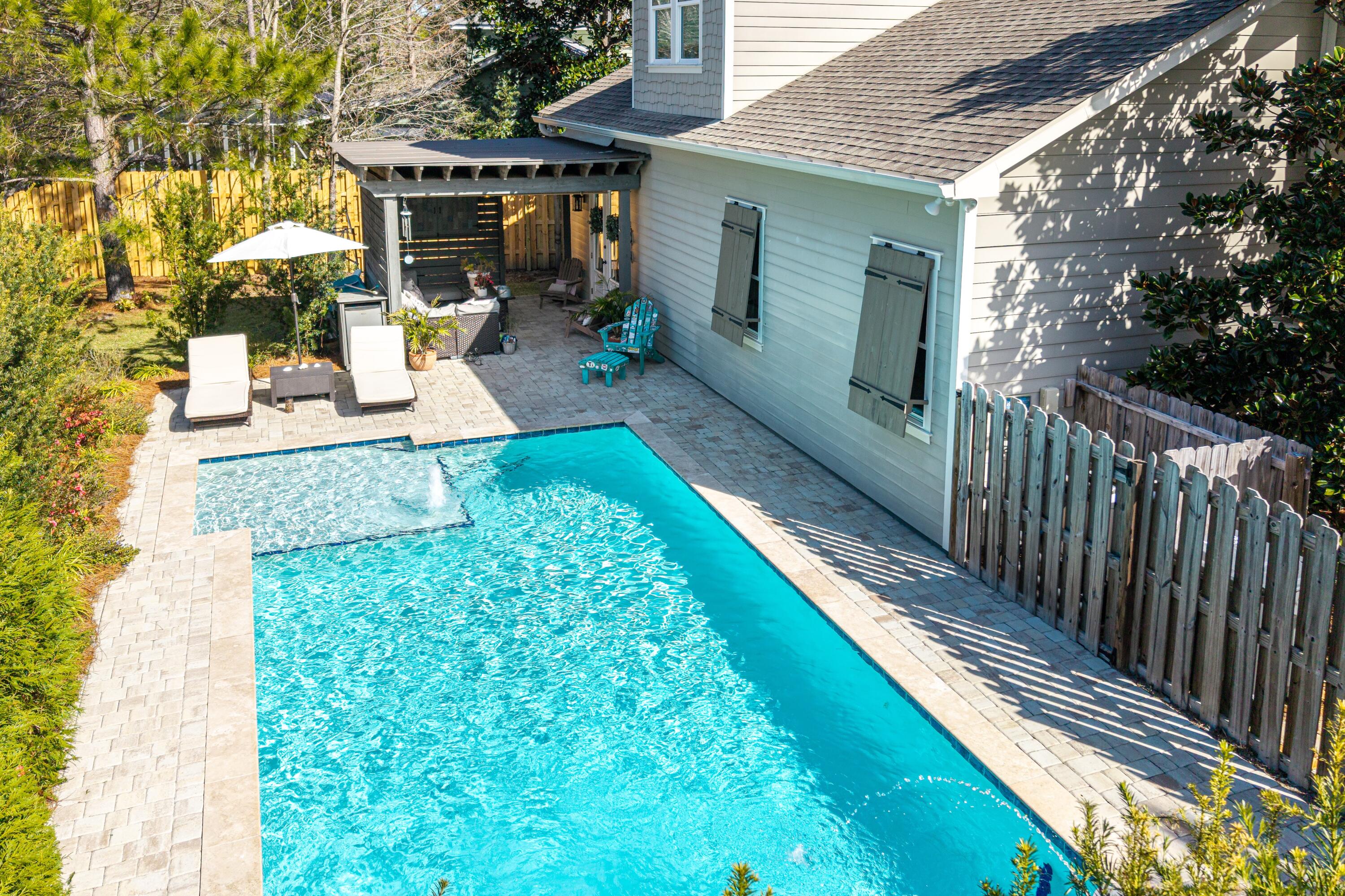 101 Botany Boulevard Santa Rosa Beach, FL 32459 - Photo 51 of 53 a front view of a house with garden