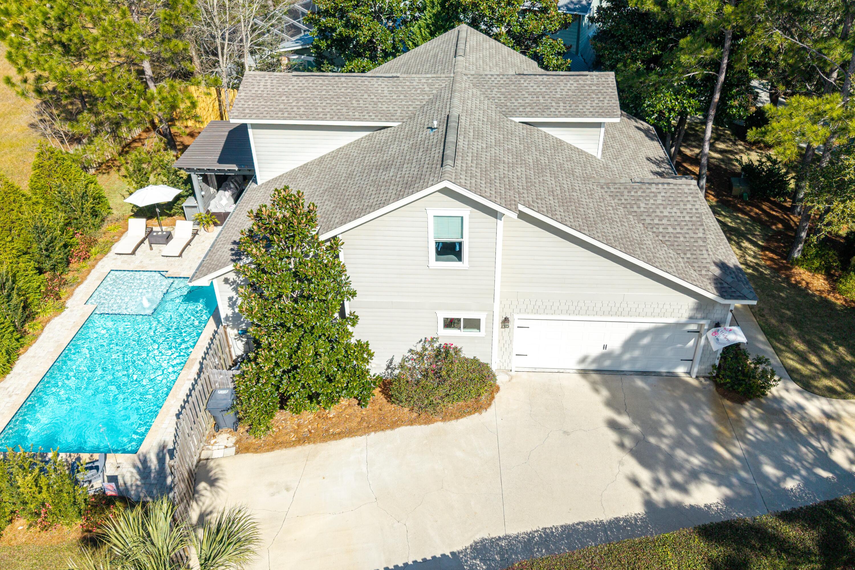 101 Botany Boulevard Santa Rosa Beach, FL 32459 - Photo 52 of 53 a view of a back yard of the house