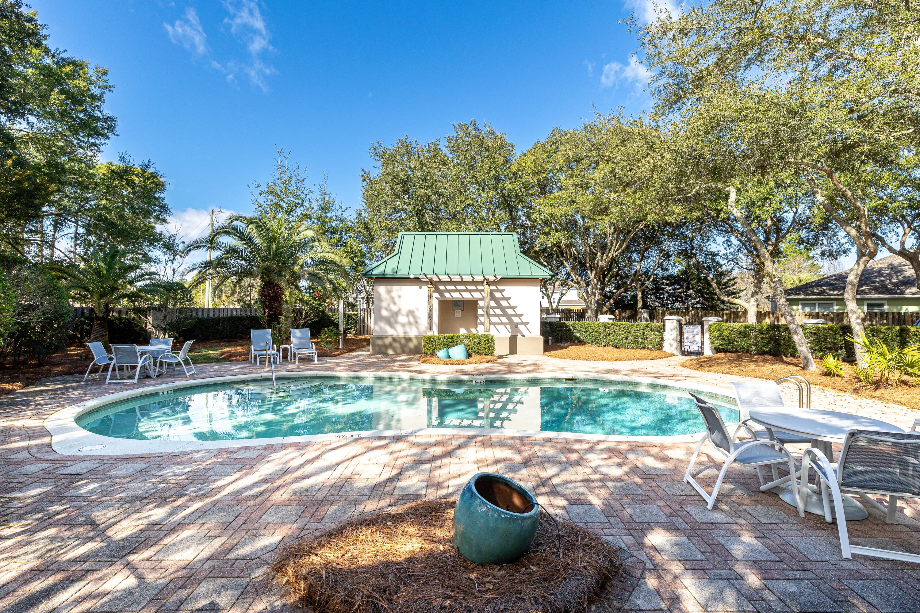 101 Botany Boulevard Santa Rosa Beach, FL 32459 - Photo 53 of 53 a view of a house with backyard and sitting area