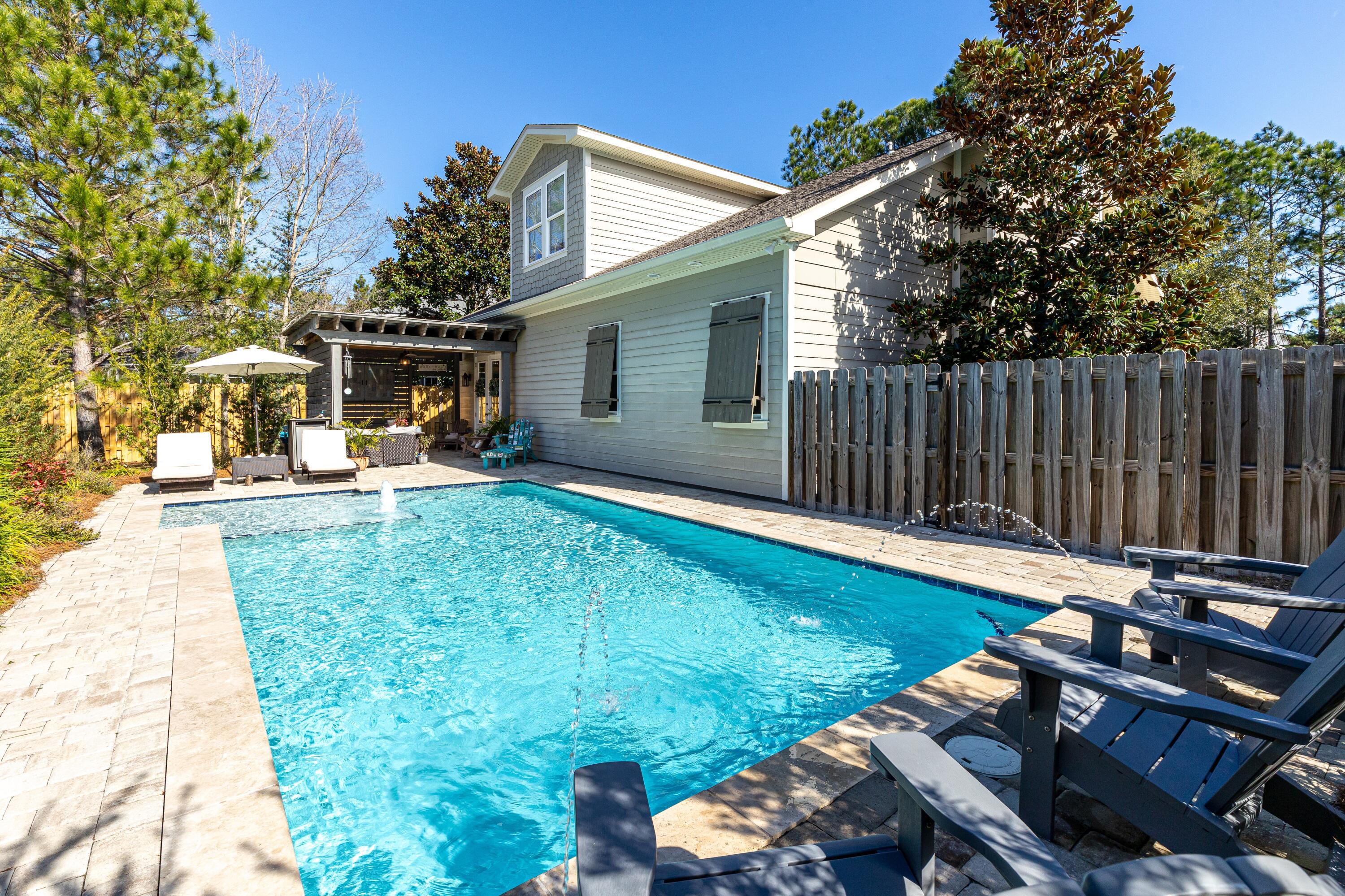 101 Botany Boulevard Santa Rosa Beach, FL 32459 - Photo 8 of 53 a view of a backyard with sitting area