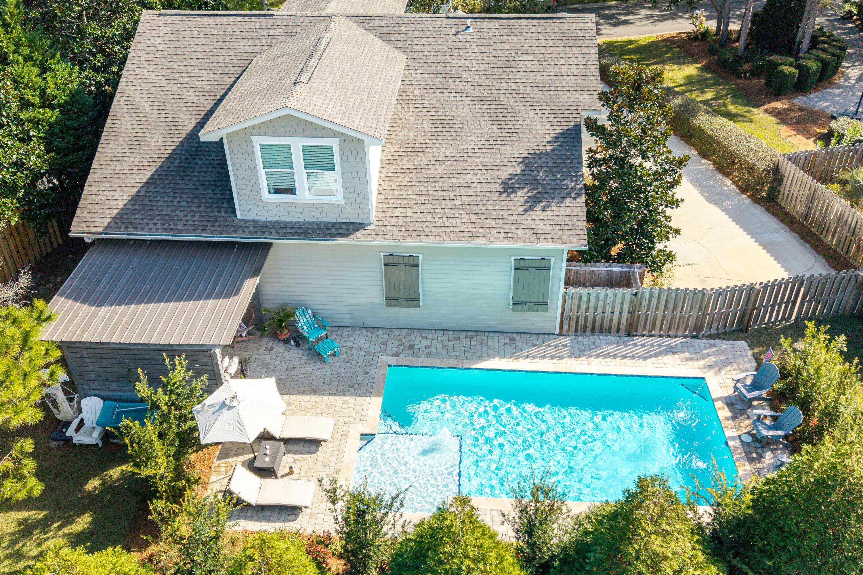 101 Botany Boulevard Santa Rosa Beach, FL 32459 - Photo 9 of 53 a view of a backyard with a garden