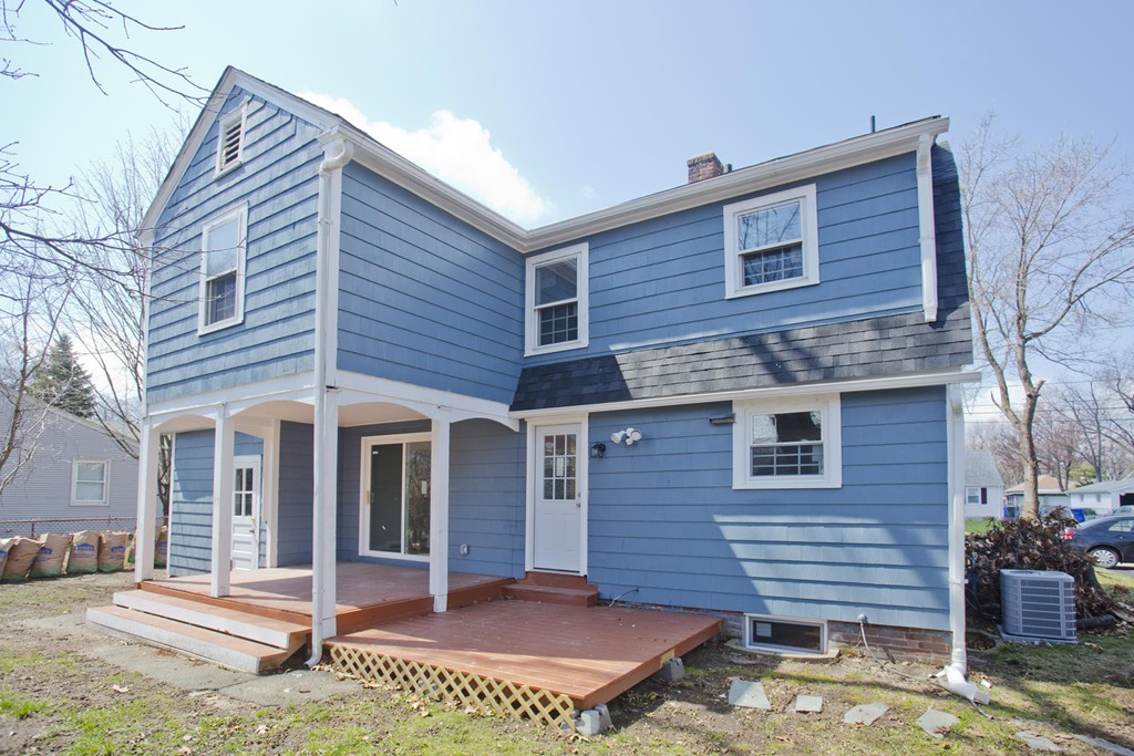 93 Haskin Street Springfield, MA 01109 - Photo 27 of 27 a front view of a house with garden