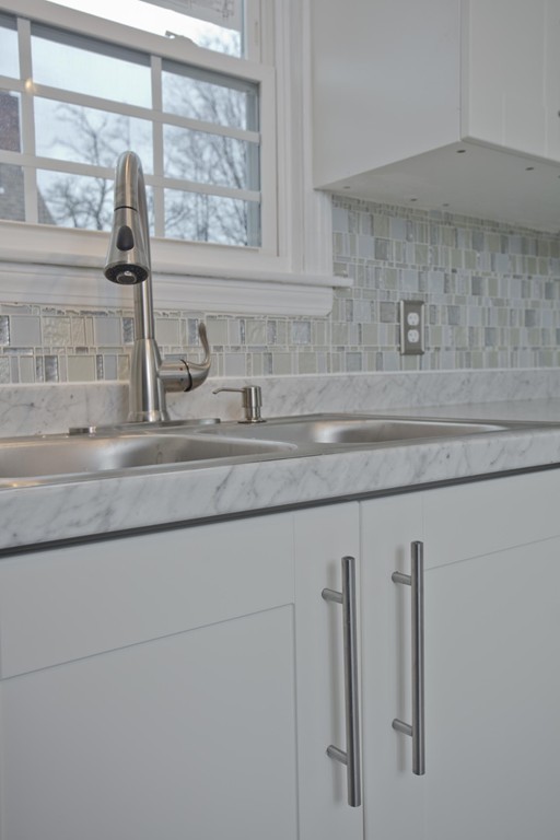 93 Haskin Street Springfield, MA 01109 - Photo 6 of 27 a kitchen with a sink and large window