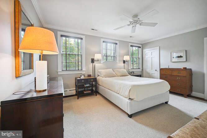 3629 Everett Street Northwest Washington, DC 20008 - Photo 22 of 51 a bedroom with a large bed and a window