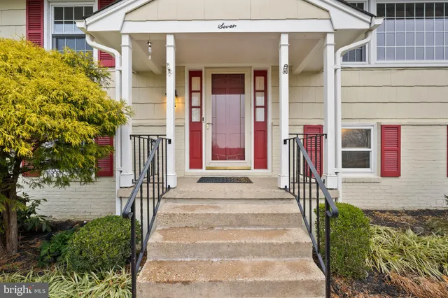 a front view of a house with a porch