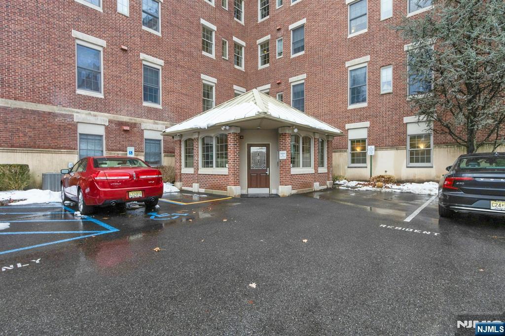 5401 Rio Vista Drive Mahwah, NJ 07430 - Photo 3 of 26 a car parked in front of a building