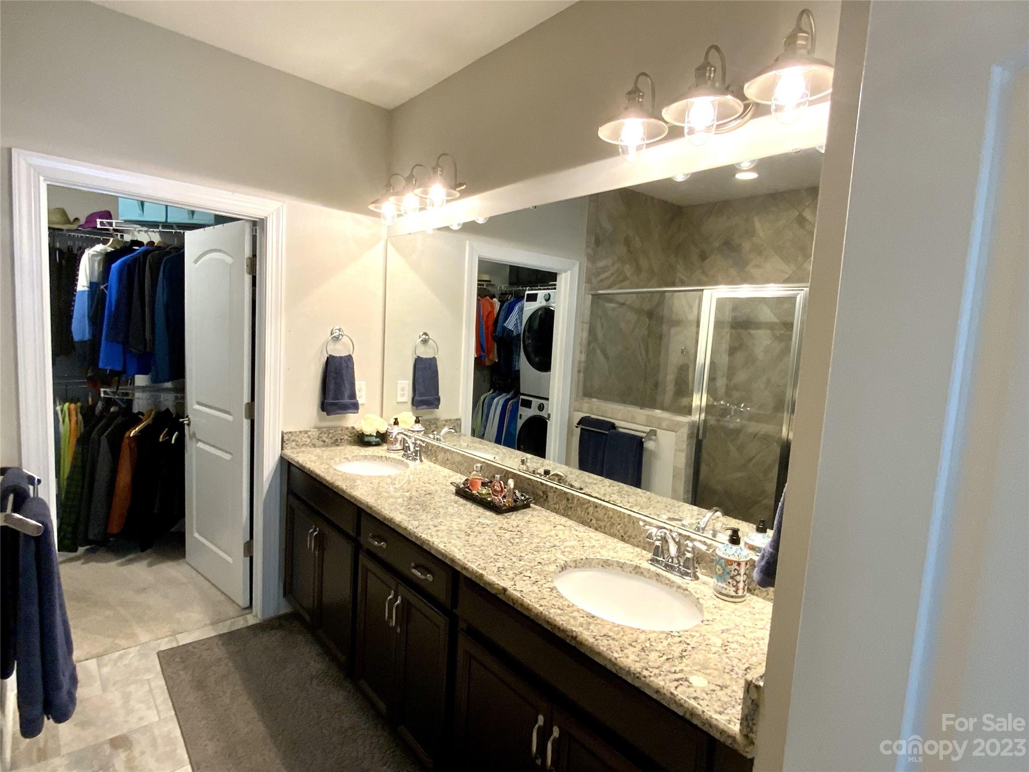 902 Ospre Lane Fort Mill, SC 29708 - Photo 20 of 44 a bathroom with a granite countertop double vanity sink and a mirror