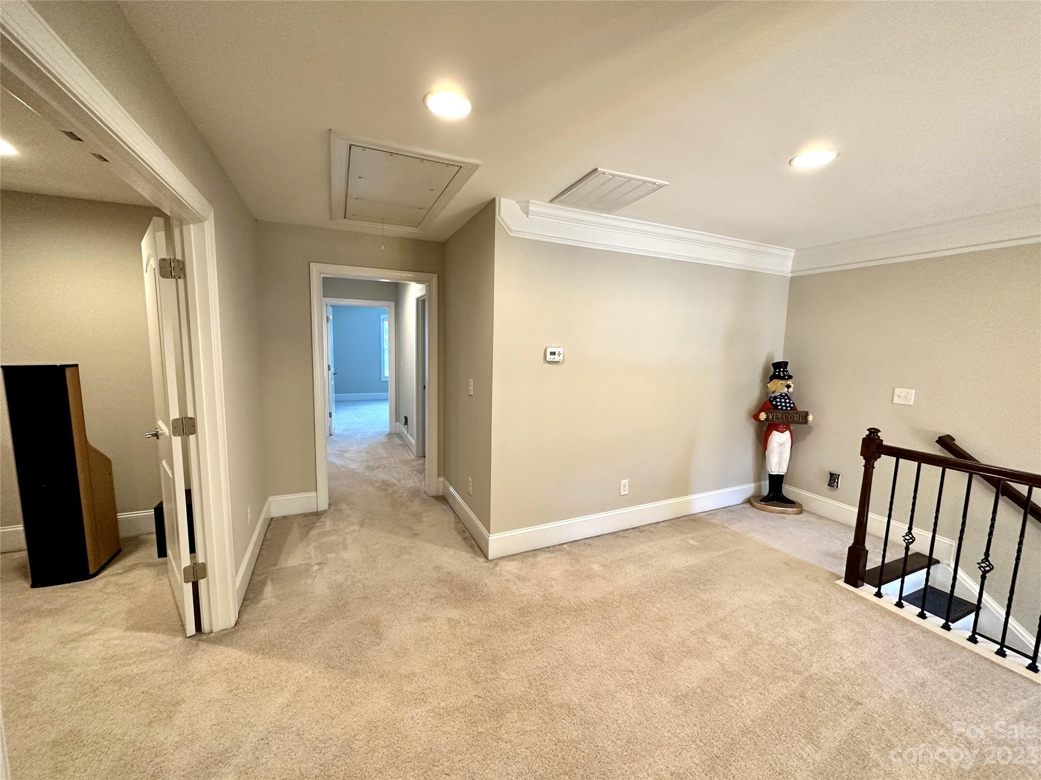 902 Ospre Lane Fort Mill, SC 29708 - Photo 23 of 44 an empty room with furniture and a flat screen tv