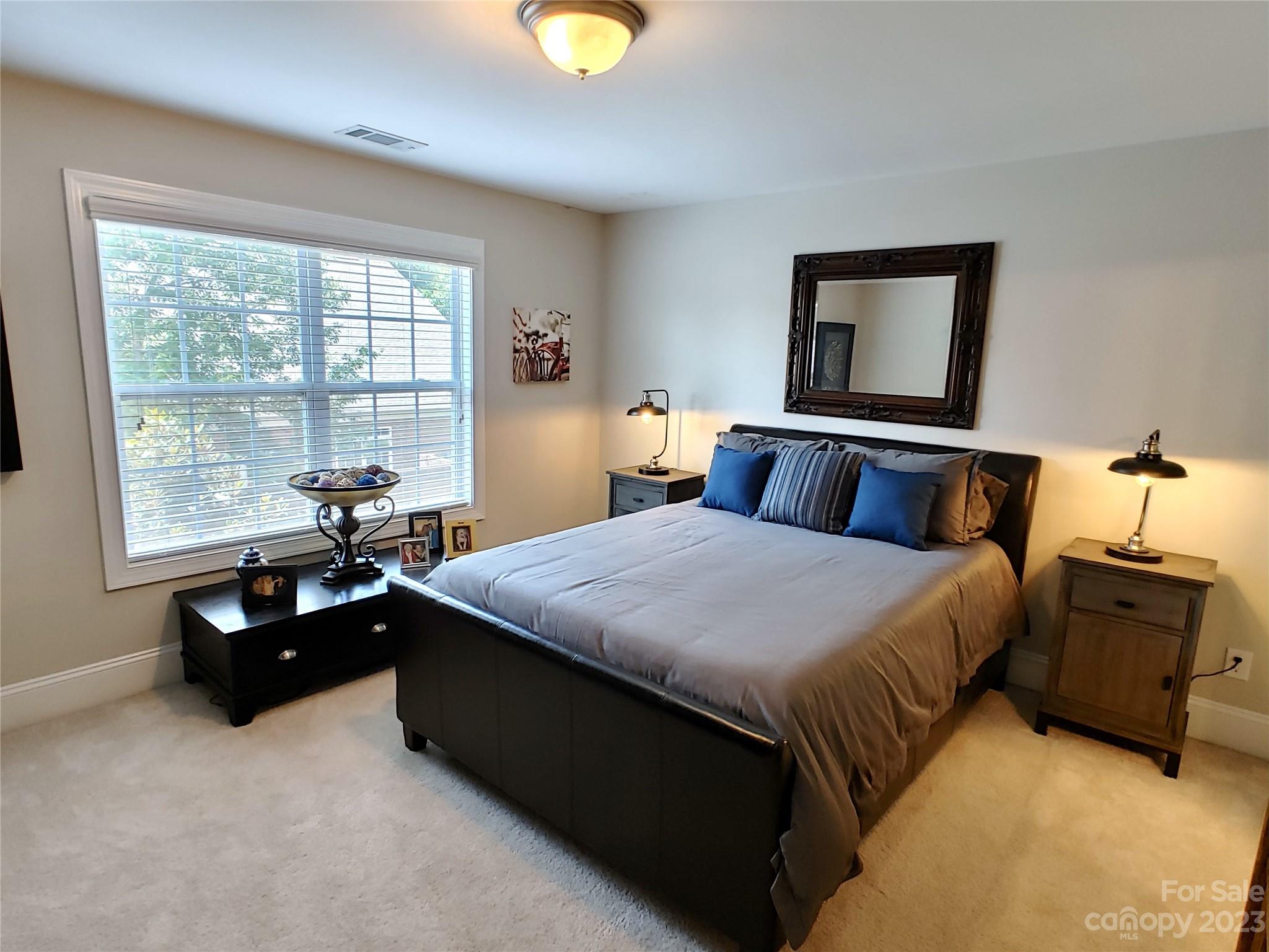902 Ospre Lane Fort Mill, SC 29708 - Photo 27 of 44 a bedroom with a bed and window