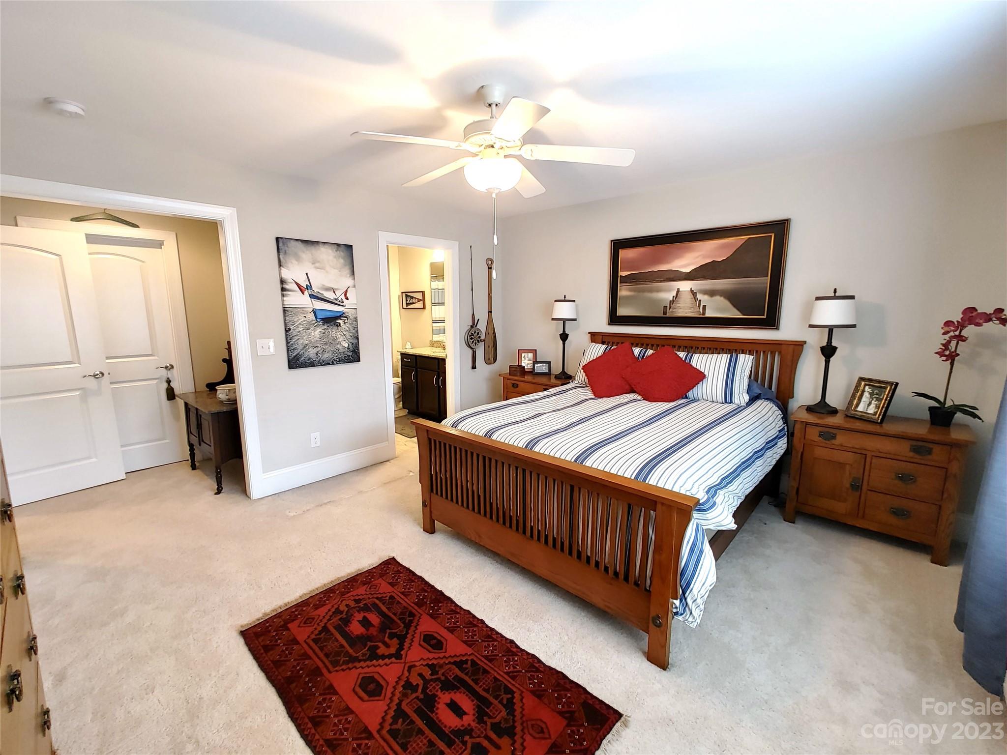 902 Ospre Lane Fort Mill, SC 29708 - Photo 30 of 44 a bedroom with a bed and ceiling fan