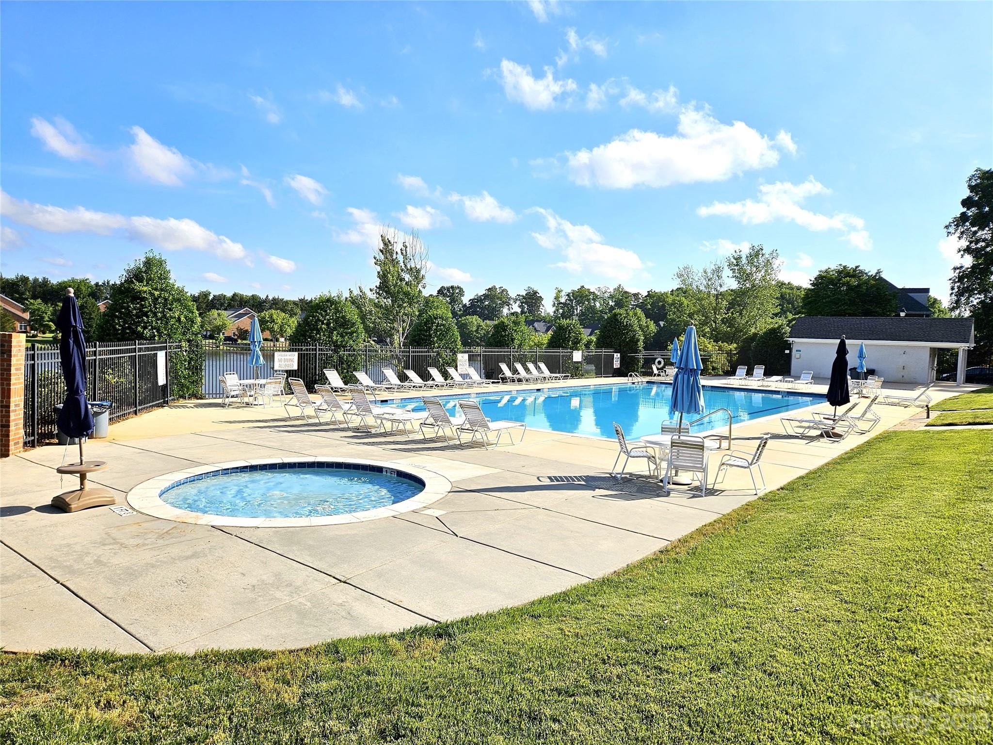 902 Ospre Lane Fort Mill, SC 29708 - Photo 41 of 44 a view of a swimming pool with an outdoor seating
