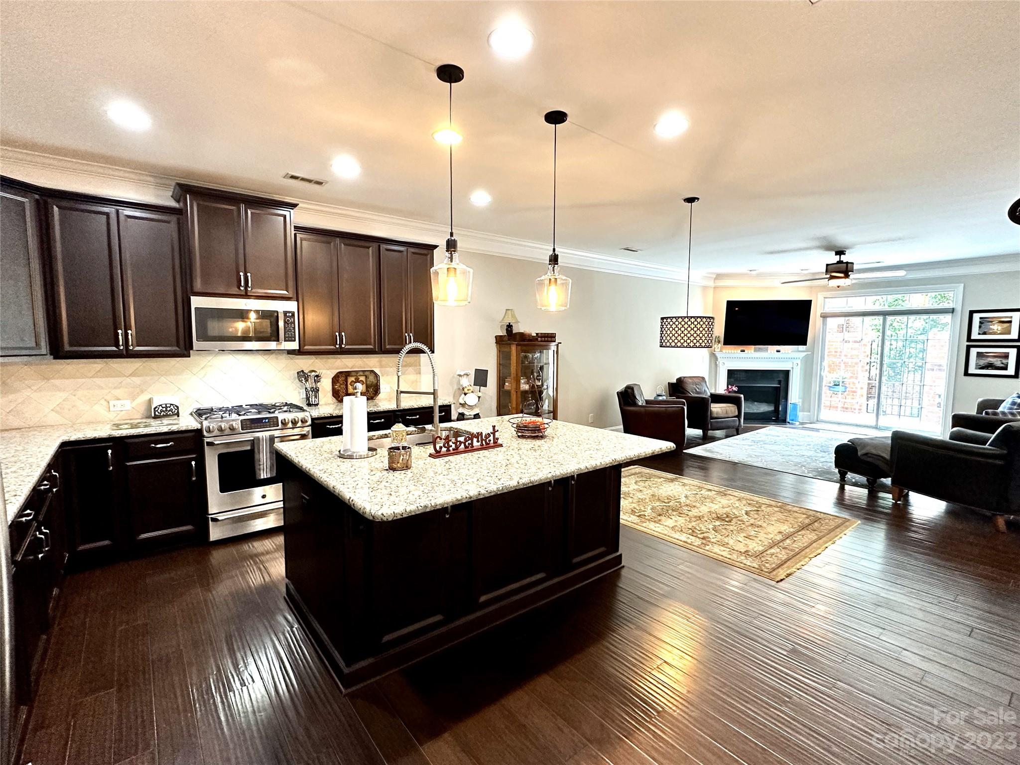 902 Ospre Lane Fort Mill, SC 29708 - Photo 7 of 44 a kitchen with a sink appliances and cabinets