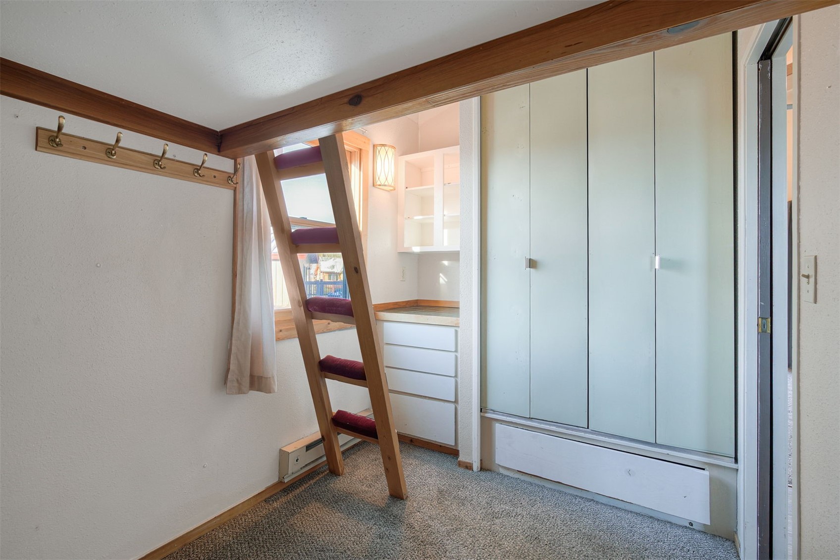 8018 Ryan Gulch Road, Unit B9 Silverthorne, CO 80498 - Photo 11 of 17 a view of an empty room