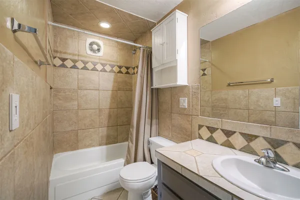 a view of a balcony with wooden floor