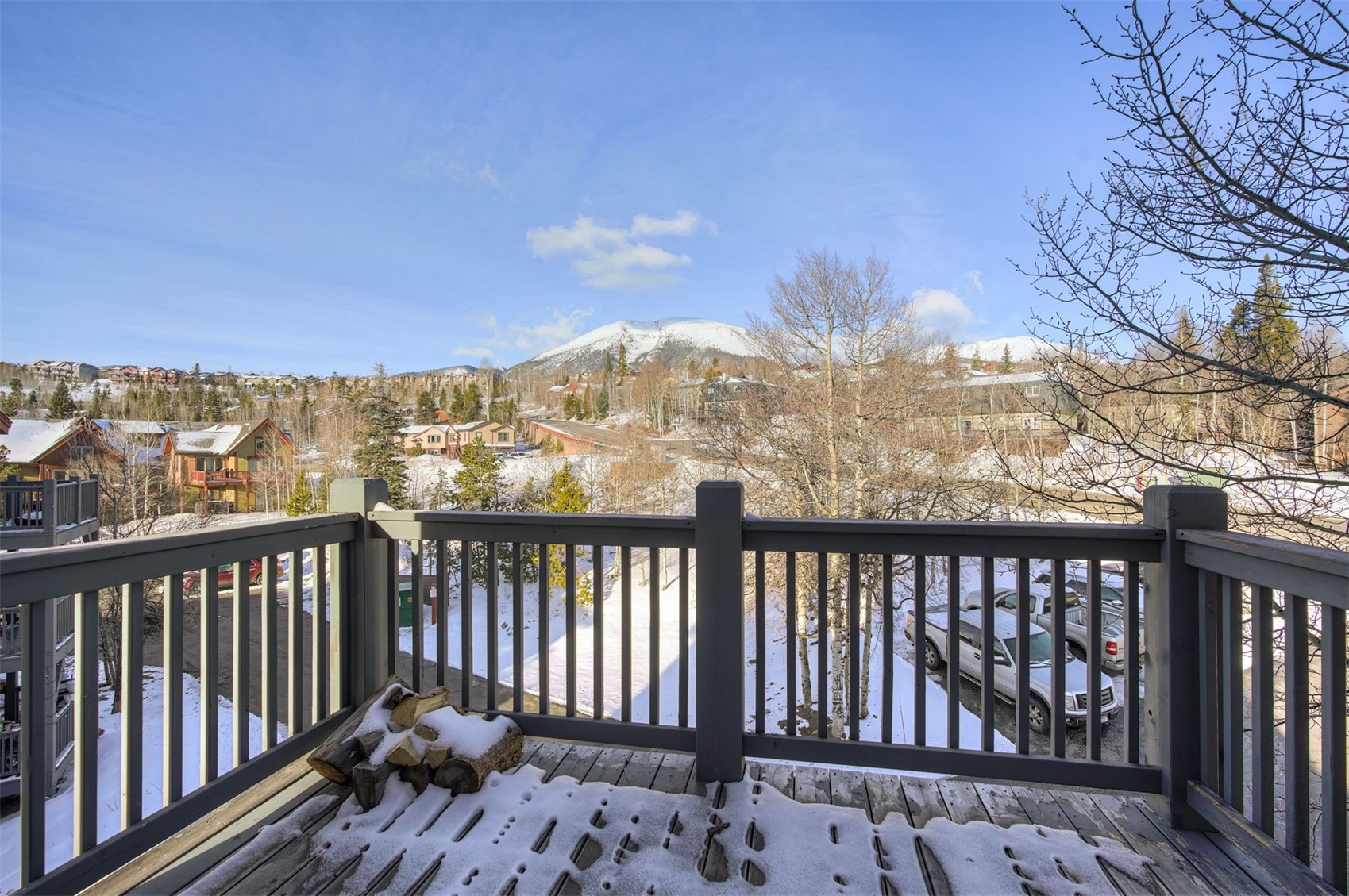8018 Ryan Gulch Road, Unit B9 Silverthorne, CO 80498 - Photo 14 of 17 a view of a balcony with wooden floor
