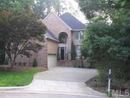 1117 Hymettus Court Raleigh, NC 27607 - Photo 1 of 1 a front view of a house with a yard and garage