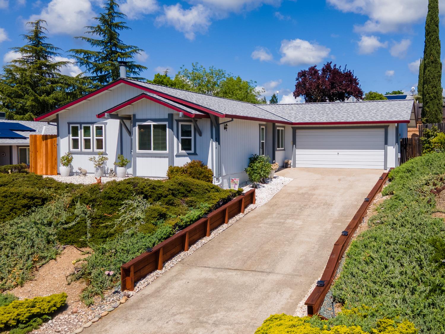 4914 Summit View Court El Dorado, CA 95623 - Photo 1 of 31 a front view of a house with a yard