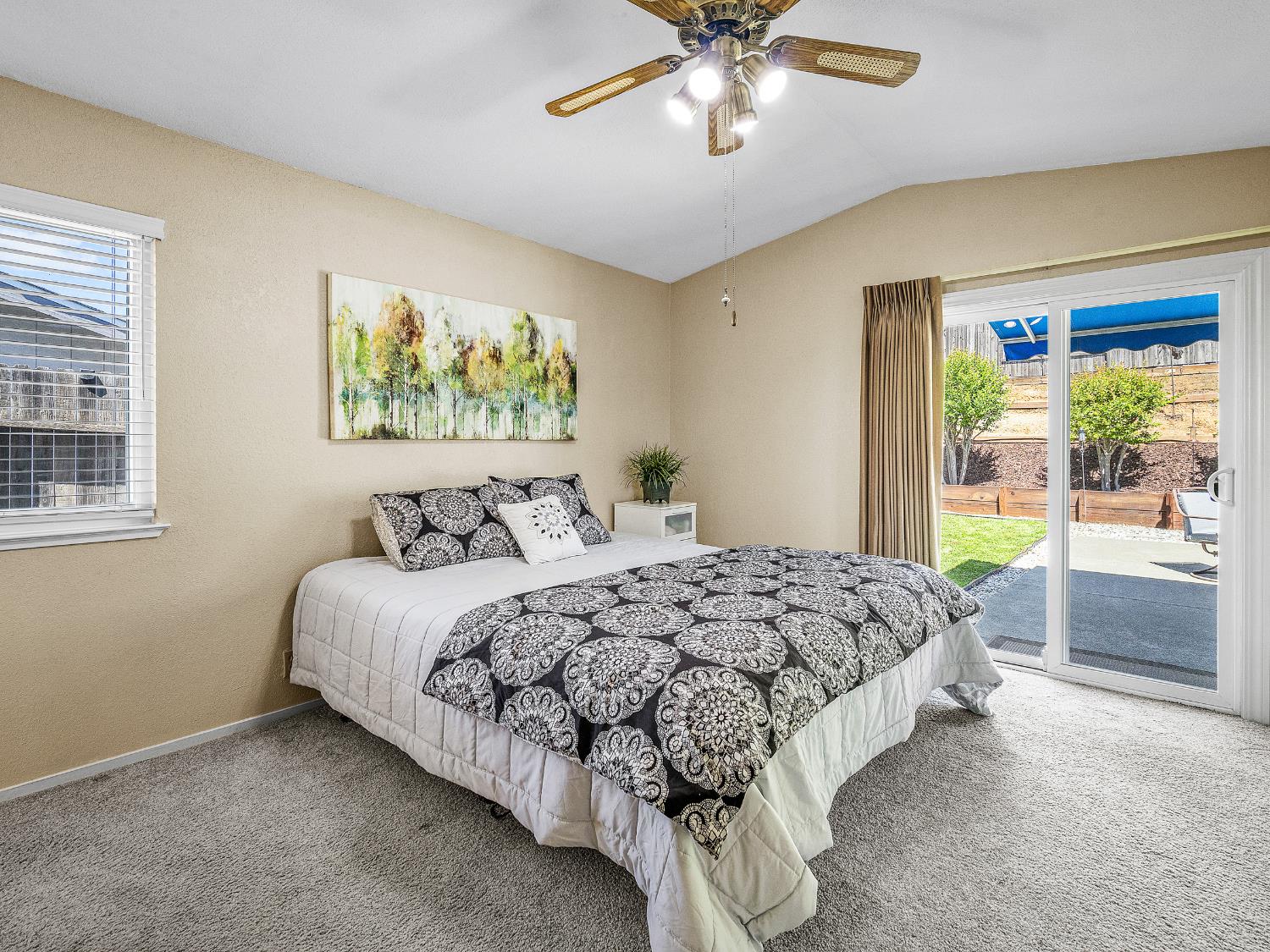 4914 Summit View Court El Dorado, CA 95623 - Photo 13 of 31 a bed sitting in a bedroom next to a window