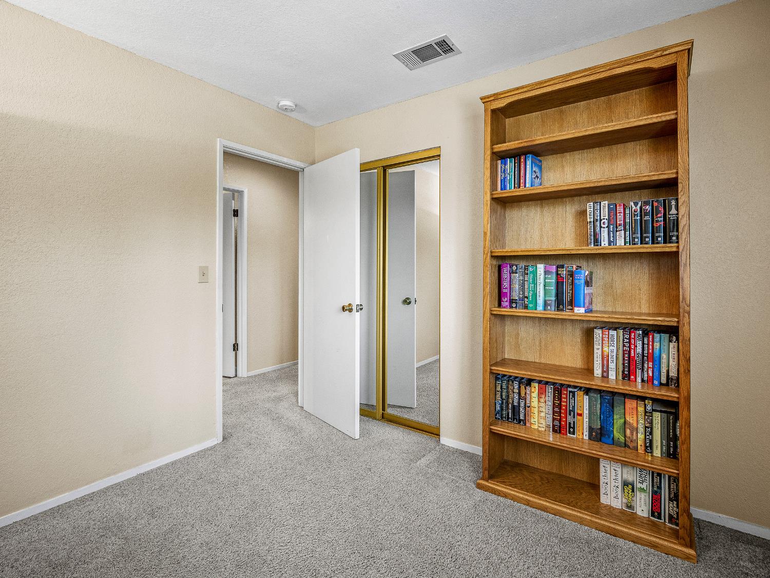 4914 Summit View Court El Dorado, CA 95623 - Photo 18 of 31 a view of room with shelves